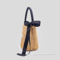 Ladies handbag with bowknot rope
